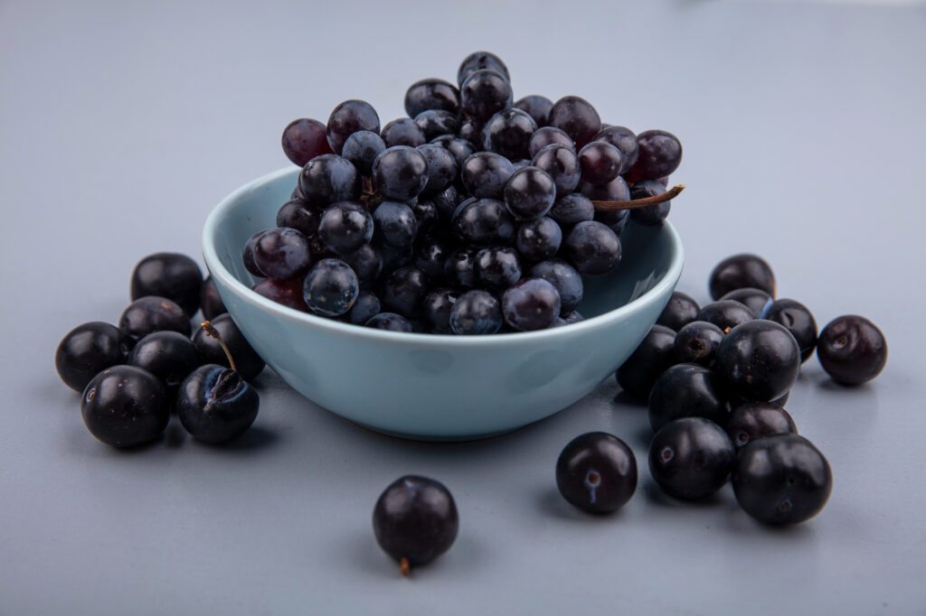 A bowl filled with fresh Healthy Food berries, rich in antioxidants and natural sweetness.